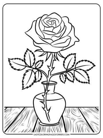 Black and white coloring page of a rose in a vase with leaves, designed for kids to color. The illustration features a detailed rose flower and a simple vase, set against a wooden surface backdrop. Ideal for creative activities and art projects.